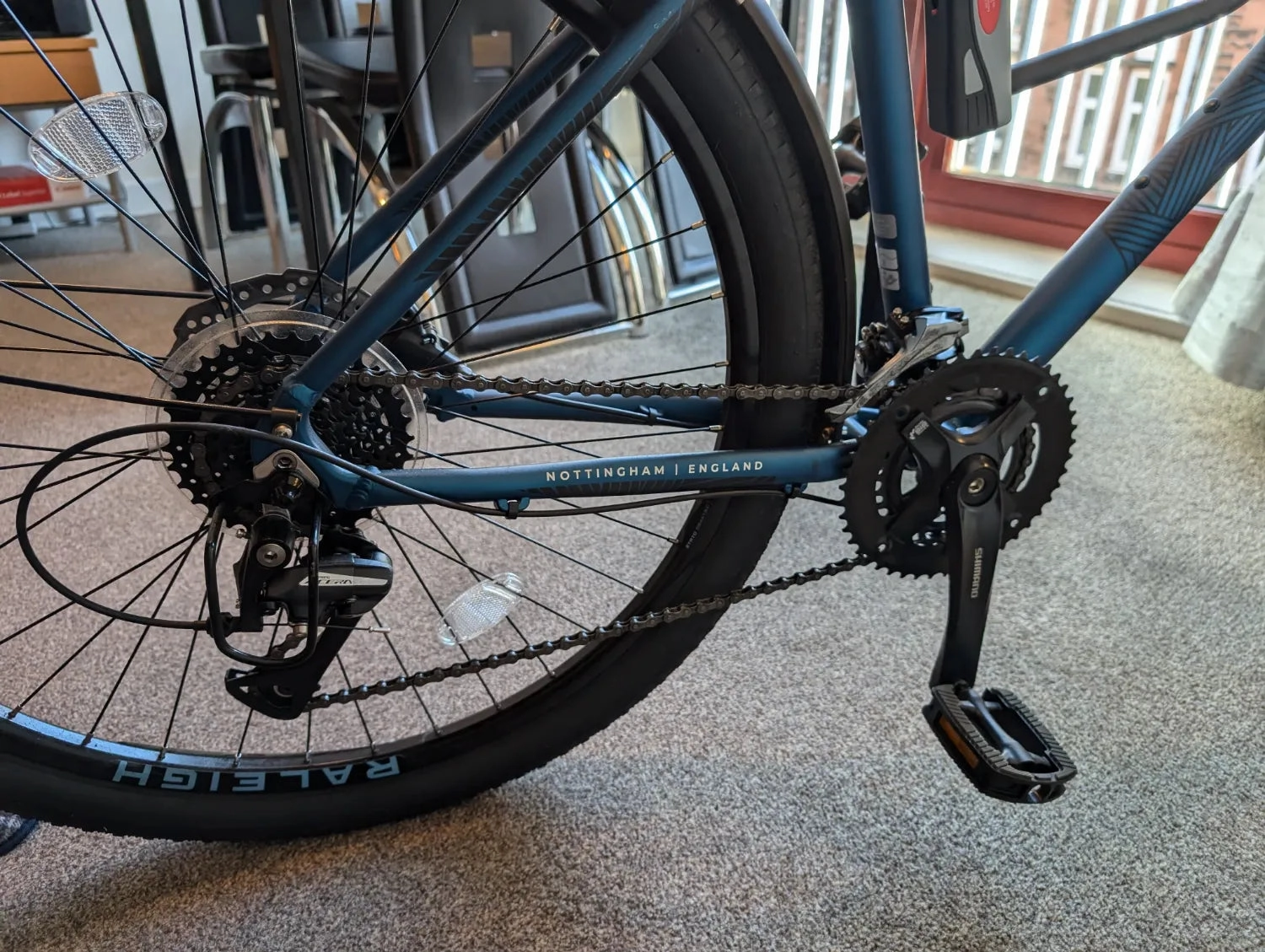 Raleigh Men's Strada City Hybrid 2024