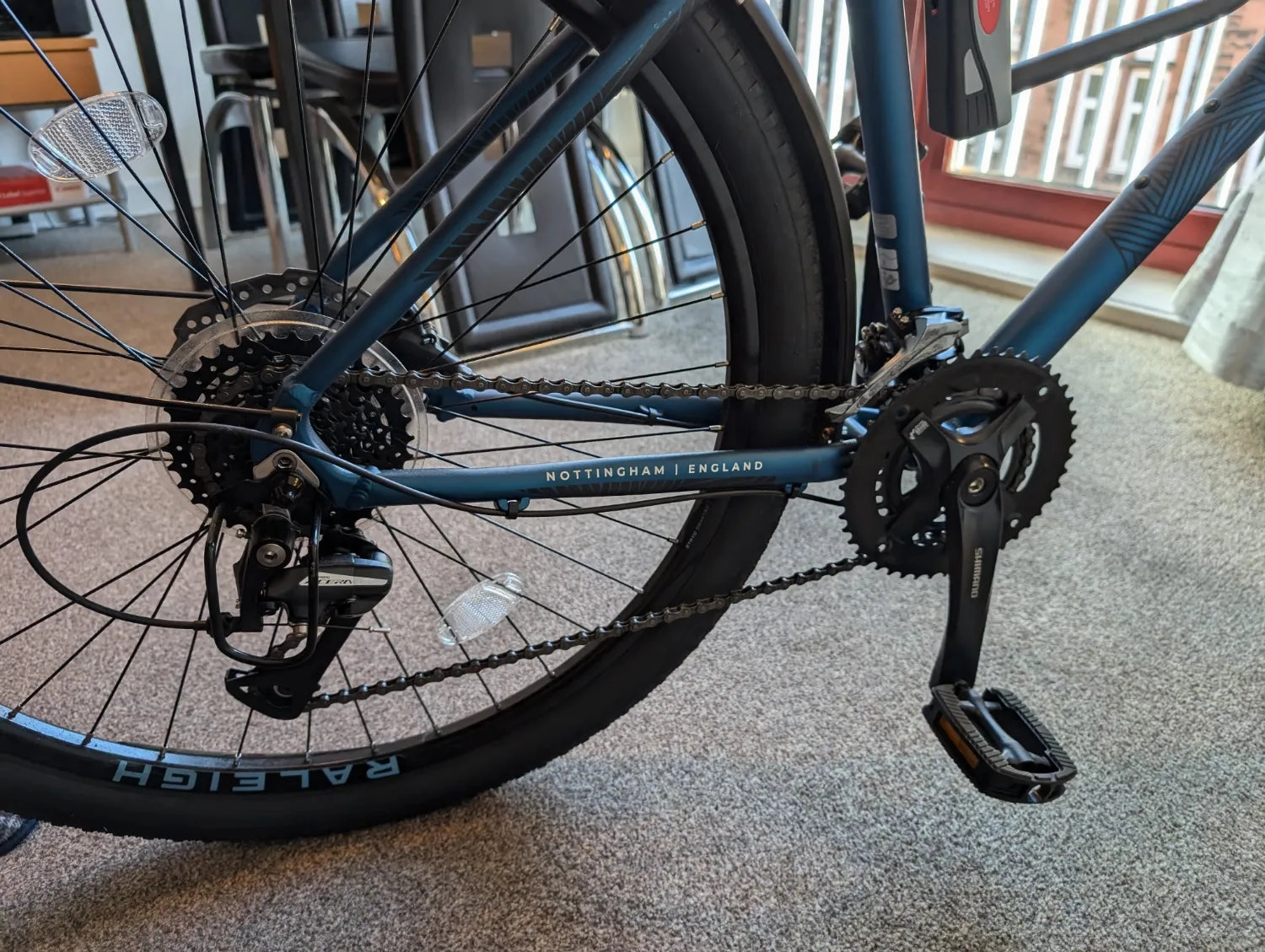Raleigh Men's Strada City Hybrid 2024